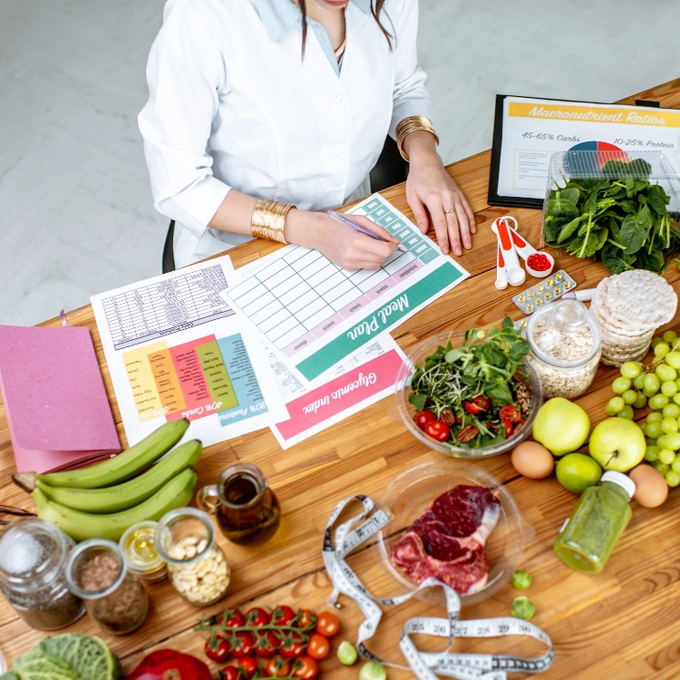 A picture of lots of fruit and veg in a bowl, to demonstrate importance of nutrition in fighting causes of hair loss